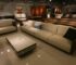 Elegant living room showcasing modern furniture with plush sofas and ambient lighting.