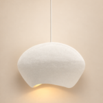 White pebble-shaped wabi-sabi pendant light with textured finish and warm glow, 70 cm