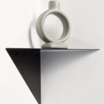 Modern black metal corner floating shelf in Qatar
