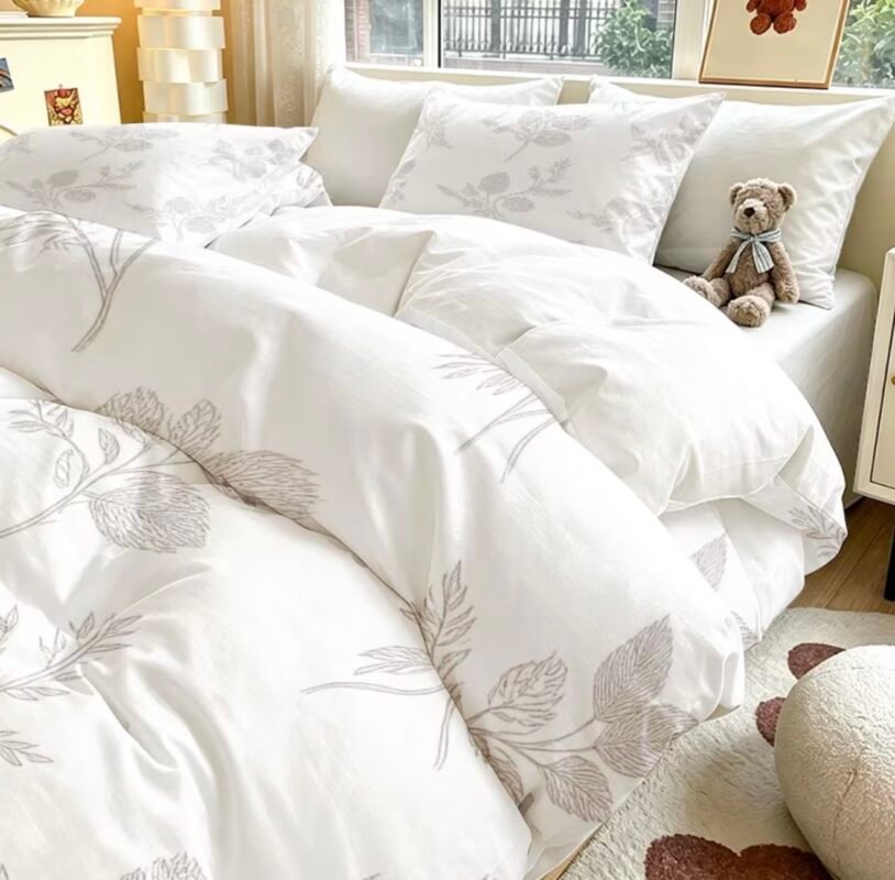 3-piece duvet cover set with two matching pillowcases on a neatly made bed