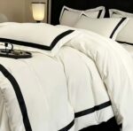 3-piece duvet cover set with two matching pillowcases on a made bed