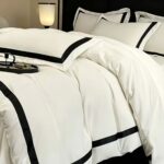 3-piece duvet cover set with two matching pillowcases on a made bed
