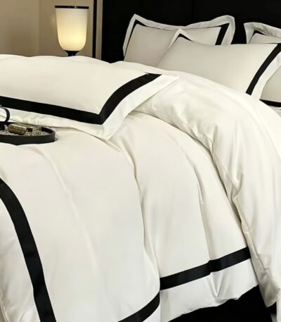 3-piece duvet cover set with two matching pillowcases on a made bed