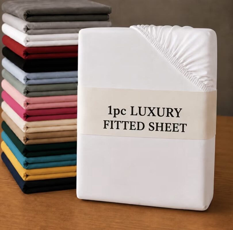 White fitted sheet smoothly fitted on a mattress in a bright bedroom