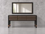 Luxury black wooden dressing table with textured brown leather drawers, copper trim and brass-capped tapered legs